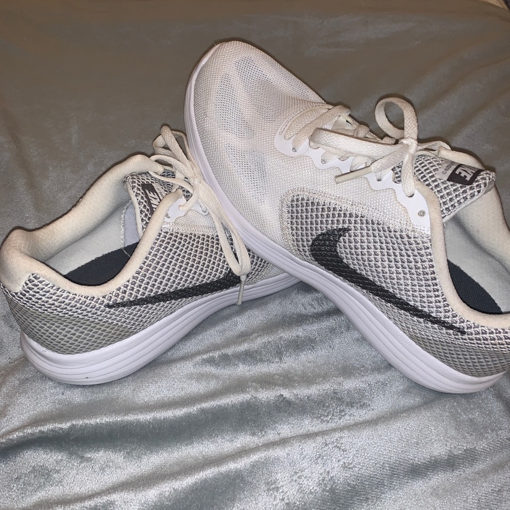 White nike athletic shoes